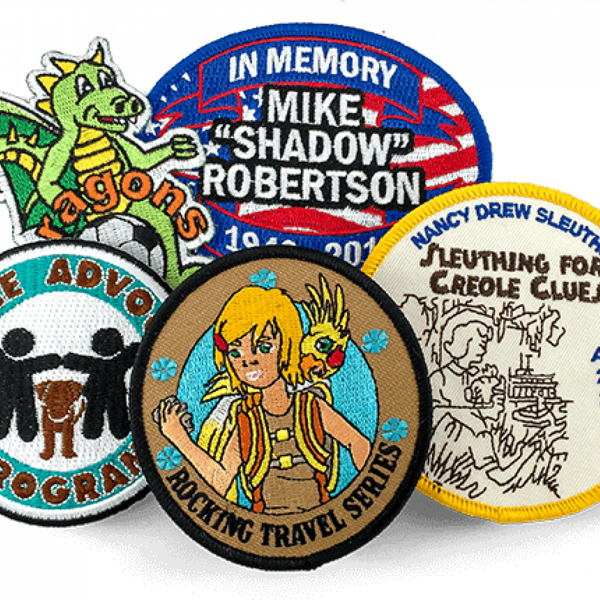 Five different embroidered patches, various shapes, sizes, colors, and designs