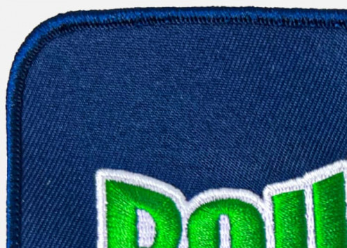 Close up view of a patch showing twill background