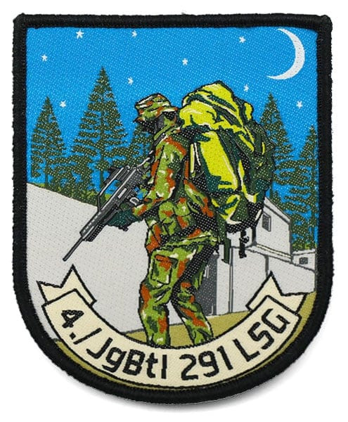 Blue, green, brown, black, and white woven patch with night scene and army soldier