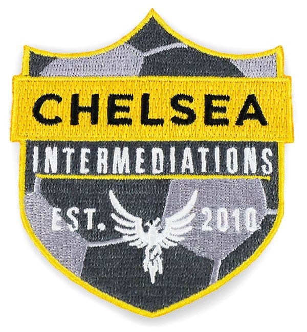 Yellow, gray, and white embroidered patch, hot cut to shield shape: Chelsea intermediations, established 2010